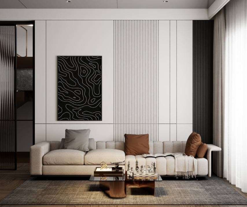 Yivli panel duvar ve grafik tablolu modern oturma alanı